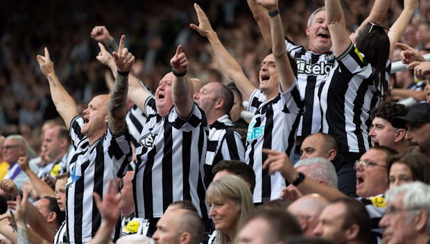 NEWCASTLE UPON TYNE, ENGLAND - AUGUST 12: Newcastle United fans singing during the Premier League match between Newcastle United and Aston Villa at St. James Park on August 12, 2023 in Newcastle upon Tyne, England. (Photo by