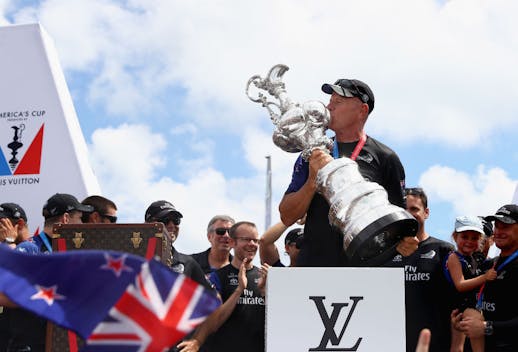 Grant Dalton lifts the America's Cup trophy for Emirates Team New Zealand in 2017. (Photo by