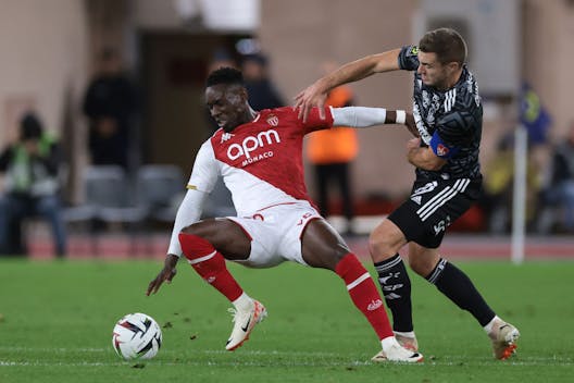 Brendan Chardonnet of Stade Brestois 29 tussles with Folarin Balogun of AS Monaco during the Ligue 1 match on November 5, 2023