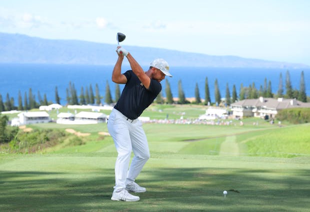 Xander Schauffele of the United States tees off during The Sentry at Kapalua Golf Club in January. (Photo by Kevin C. Cox/Getty Images)