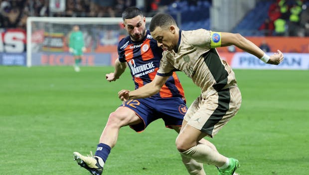 MONTPELLIER, FRANCE - MARCH 17: Captain of Paris Saint-Germain, Kylian Mbappe #7 in action with Jordan Ferri #12 of Montpellier during the Ligue 1 Uber Eats match between Montpellier HSC and Paris Saint-Germain at Stade de la Mosson on March 17, 2024 in Montpellier, France. (Photo by Xavier Laine/Getty Images)